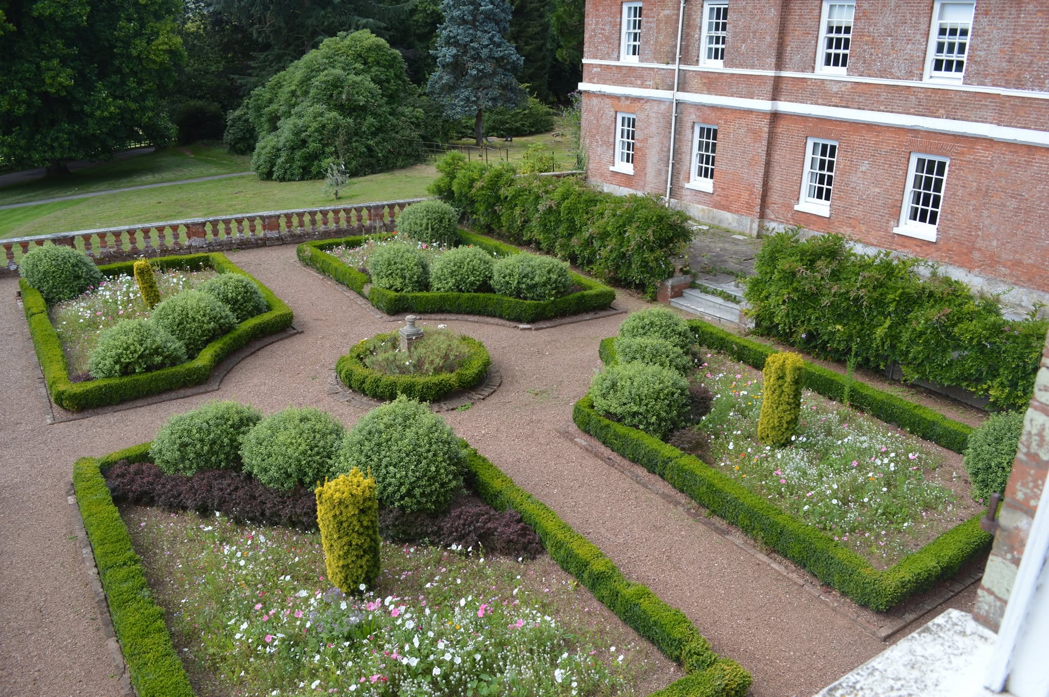 Formal gardens and red-brick buildings at Bicton College, East Budleigh