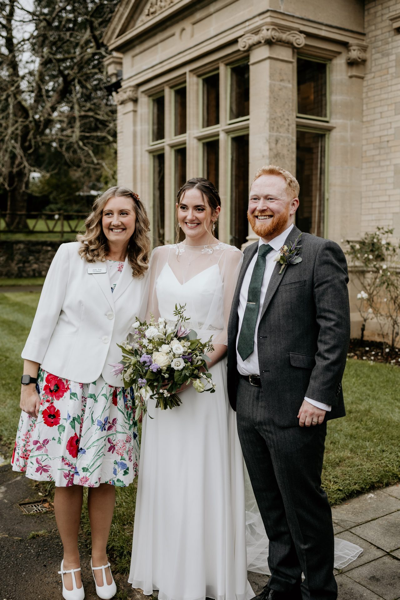 Julie Fox with Emily and Owen after their wedding ceremony
