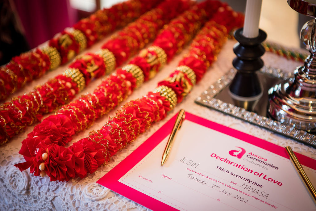 Garlands and a Declaration of Love certificate at Mansa and Albin's wedding