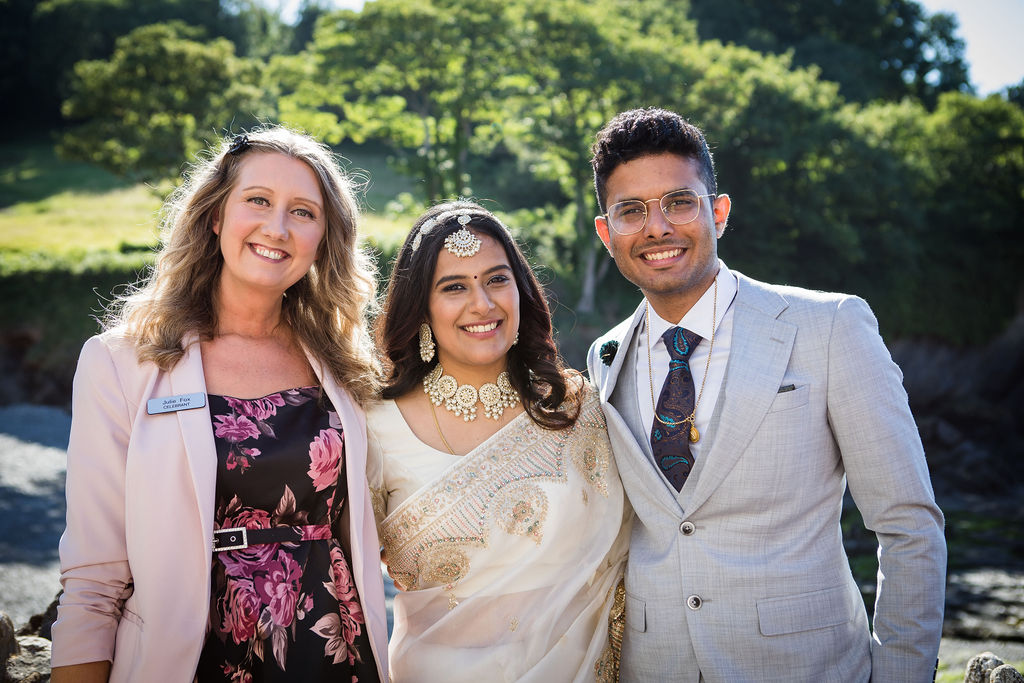 Julie Fox with Mansa and Albin after their wedding at Arches Beach, Combe Martin